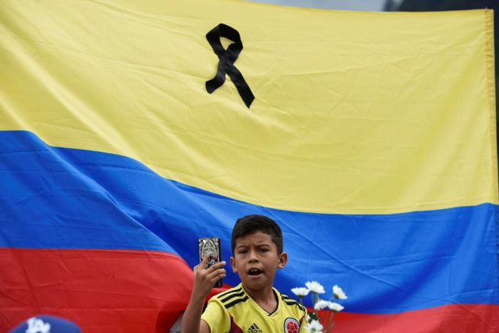 Thousands of people marched throughout Colombia on Sunday to condemn the car bombing, the deadliest attack with explosives in the city of Bogata since 2003