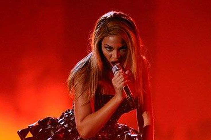 Bey performs at the 2010 Grammy's in lavish Kama Ankle Giuseppe Zanotti boots