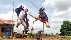 Majid Michel and Benjamin Lugo on set