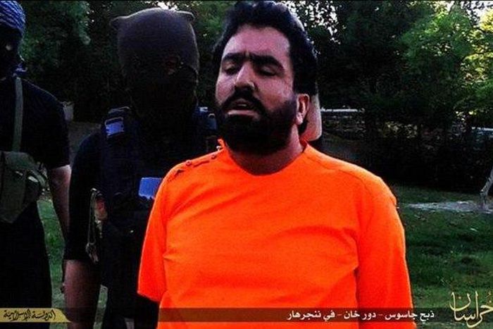 Pictures released online appear to show an Islamic State fighter being beheaded after being accused of defecting to the Taliban in Afghanistan where a bloody turf war has broken out between the two groups   