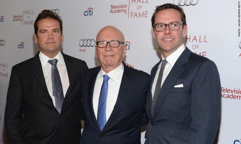 Rupert Mudochflanked by his two sons, James and Lanchlan Mudorch