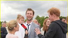 Chris Hemsworth, daughter, wife greet Prince Harry in London