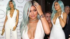 Kylie Jenner steps out in white with blue hair & massive cleavage