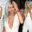 Kylie Jenner steps out in white with blue hair & massive cleavage