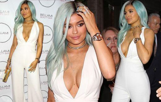 Kylie Jenner steps out in white with blue hair & massive cleavage
