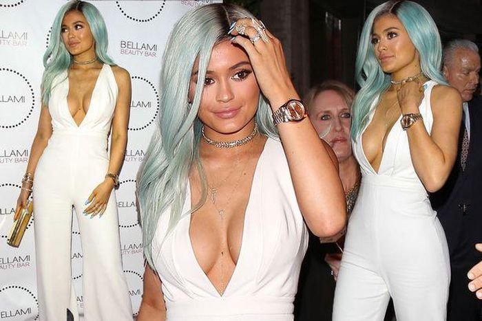 Kylie Jenner steps out in white with blue hair & massive cleavage