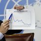 Bruce Aylward, Assistant Director-General for Emergencies at the World Health Organization shows a graph during a news conference on Ebola aside of the World Health Assembly at the United Nations in Geneva, Switzerland, May 26, 2015. REUTERS/Denis Bali...