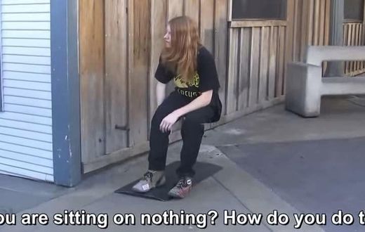 In this video, a man pretends to levitate in the air (sitting on an invisible chair).