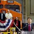 Lorenzo Simonelli speaking during the unveiling of a new fuel efficient and lower emissions locomotive at a GE plant