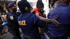 Police in Johannesburg have detained a number of foreigners after raids on buildings in the city