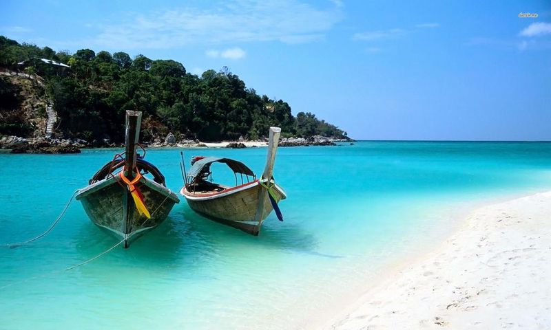 ___3944317___https:______static.pulse.com.gh___webservice___escenic___binary___3944317___2015___7___6___17___19366-boats-on-zanzibar-beach-1920x1200-beach-wallpaper