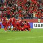 Vietnam's players celebrate their shoot-out victory over Jordan