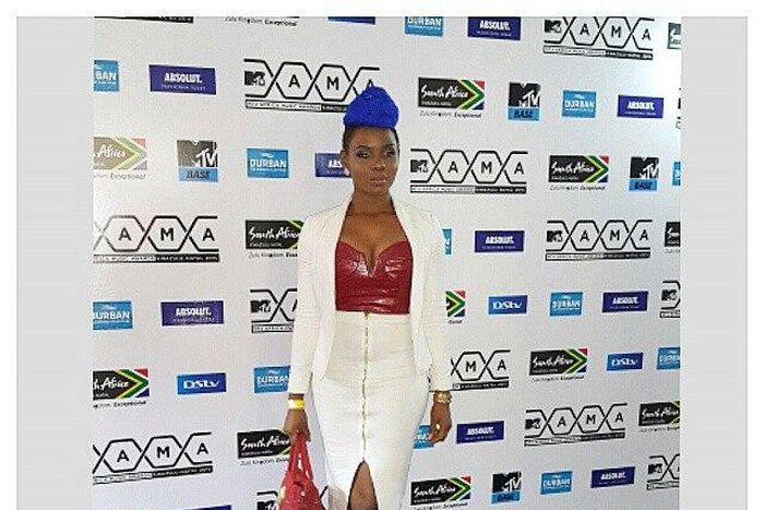 Yemi Alade rocks cobalt blue bun yesterday at an a event in Lagos