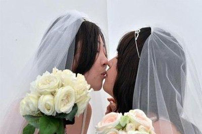 Lesbian Japanese couple at their wedding