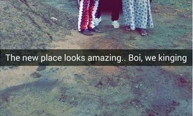 Reekado Banks with his parents in front of the completed house