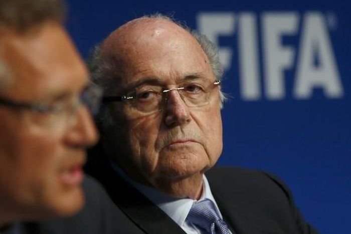 FIFA President Sepp Blatter listens to secretary general Jerome Valcke (L) during a news conference after a meeting of the FIFA executive committee in Zurich March 20, 2015. REUTERS/Arnd Wiegmann