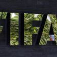 The logo of soccer's international governing body FIFA is seen on its headquarters in Zurich, Switzerland, May 27, 2015. REUTERS/Ruben Sprich