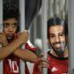 A fan wearing a mask of Egyptian football star Mohamed Salah poses for a photograph prior to the 2019 Africa Cup of Nations qualifier between Egypt and Niger on September 8, 2018 at the Borg el-Arab stadium near the Mediterranean city of Alexandria