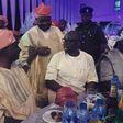 Senator Iyiola Omisore and Governor Fayose enjoy a quick chat while guests watched on