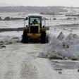 Local authorities clear a road blocked by snowfall in Tunisia, on January 25, 2019