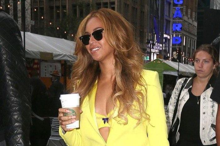 Beyonce in bright yellow attire