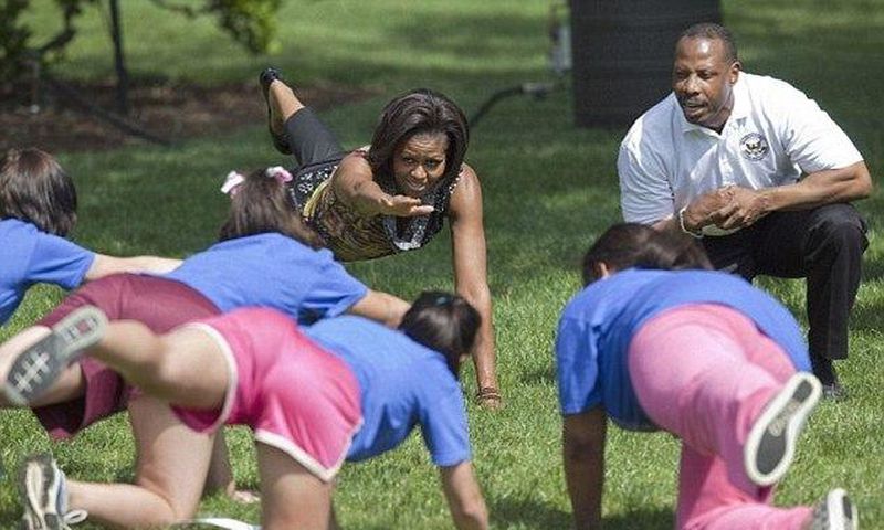 Michelle Obama working out with others