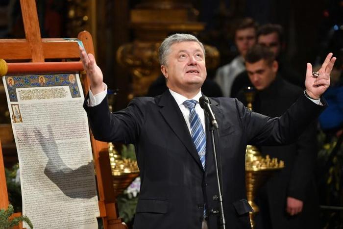 Ukrainian President Petro Poroshenko attended the service in Kiev's most ancient church, the 11th-century Saint Sophia's Cathedral