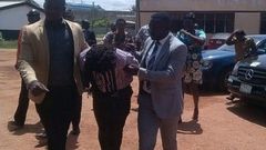 Gregory Afoko a.k.a Rasta (in the middle)