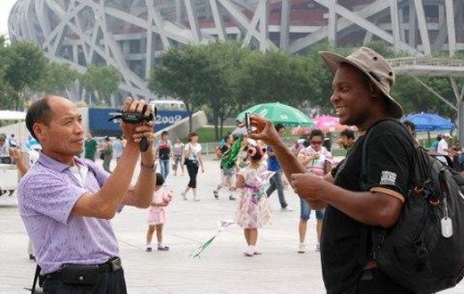 ___3842289___https:______static.pulse.com.gh___webservice___escenic___binary___3842289___2015___6___8___18___davis-china-tourist-2-480x321