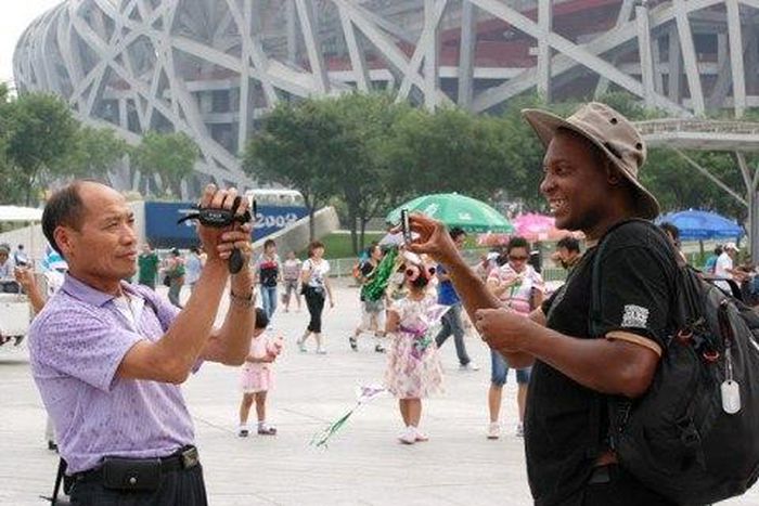 ___3842289___https:______static.pulse.com.gh___webservice___escenic___binary___3842289___2015___6___8___18___davis-china-tourist-2-480x321