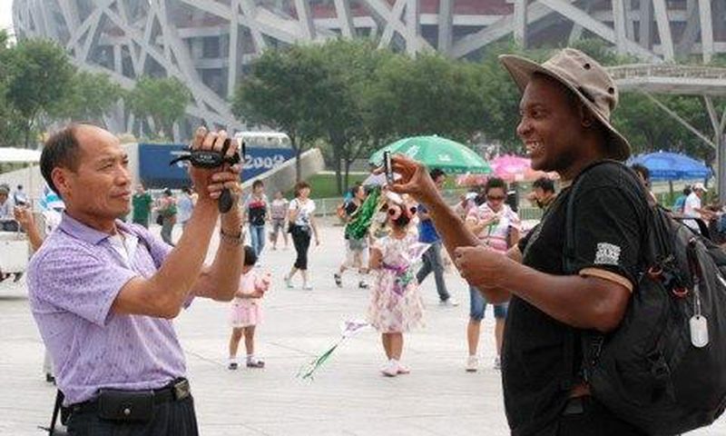 ___3842289___https:______static.pulse.com.gh___webservice___escenic___binary___3842289___2015___6___8___18___davis-china-tourist-2-480x321