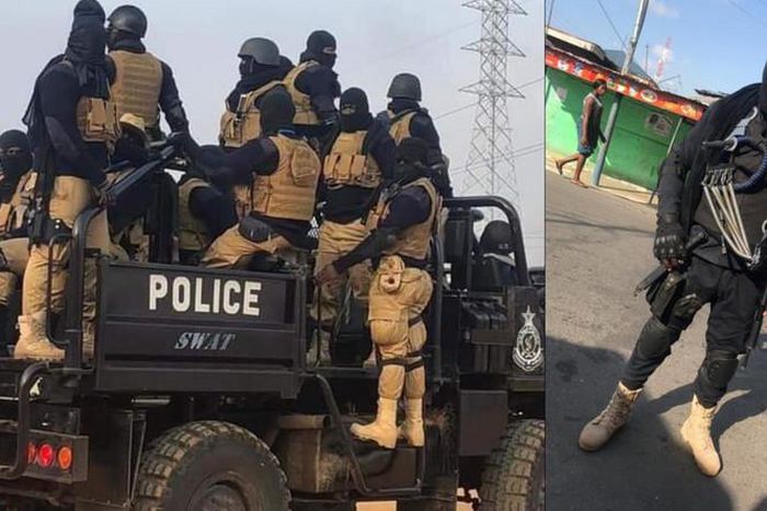 Masked National Security personnel at the polling station