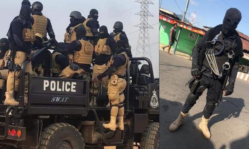 Masked National Security personnel at the polling station