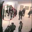 An image grab taken from a video footage released by the Russian Interior Ministry shows a man, stealing a painting by Arkhip Kuindzh at Moscow's Tretyakov Gallery