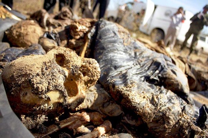 Bodies recovered from mass graves in Igula, May 204