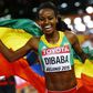 Genzebe Dibaba of Ethiopia holds her national flag after winning the women's 1500 metres final at the 15th IAAF World Championships at the National Stadium in Beijing, China August 25, 2015.     REUTERS/Kai Pfaffenbach