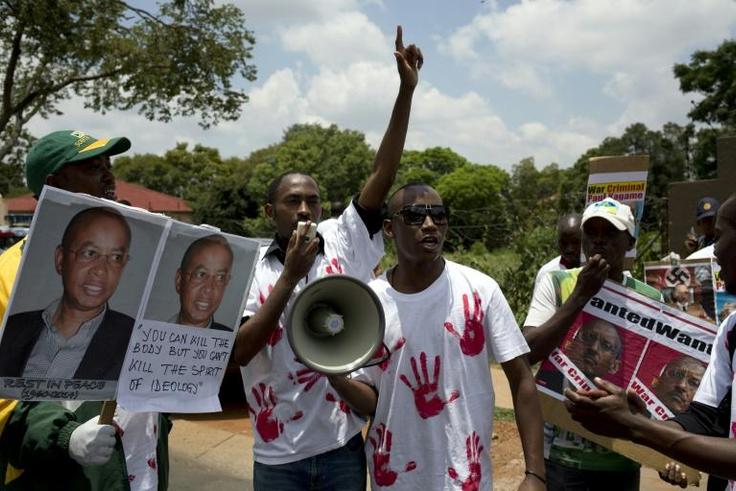 January 2014: Members of the Rwandan National Congress protest at Karegeya's death outside the Rwandan embassy in Pretoria