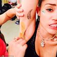 Miley Cyrus getting her armpits waxed