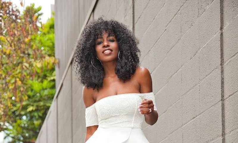 Folake Huntoon scores denim with flirty off shoulder top