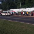 Some of the passengers stranded at Shangri-la bus stop in Accra