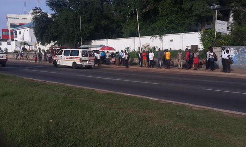 Some of the passengers stranded at Shangri-la bus stop in Accra