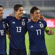 Shiotani (second left) scored as Japan saw off Uzbekistan 2-1