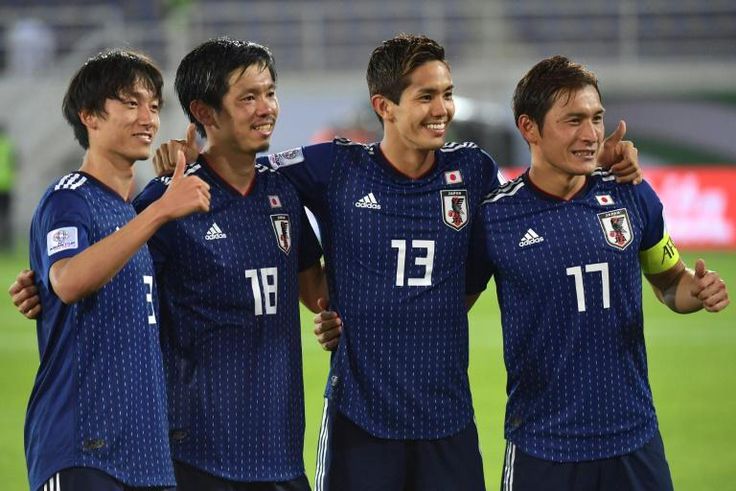 Shiotani (second left) scored as Japan saw off Uzbekistan 2-1