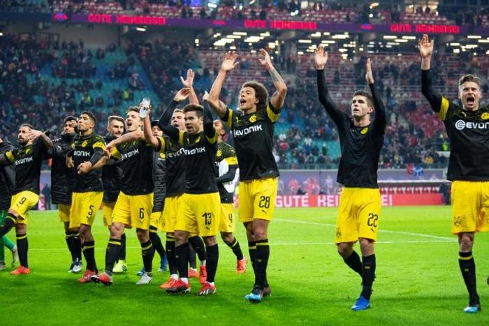 Belgian midfielder Axel Witsel (third from right) leads the celebrations after his goal at RB Leipzig kept Borussia Dortmund six points clear of Bayern Munich at the top of the Bundesliga.
