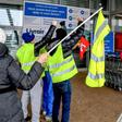 About 30 "yellow vest" protestors joined striking employees at a hardware store in Englos, northern France, on Friday who were seeking higher pay