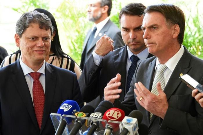 Brazilian PresidentBrazilian senator Flavio Bolsonaro (left), pictured with his father President Jair Bolsonaro in November 2018, will both see the ruling as a blow