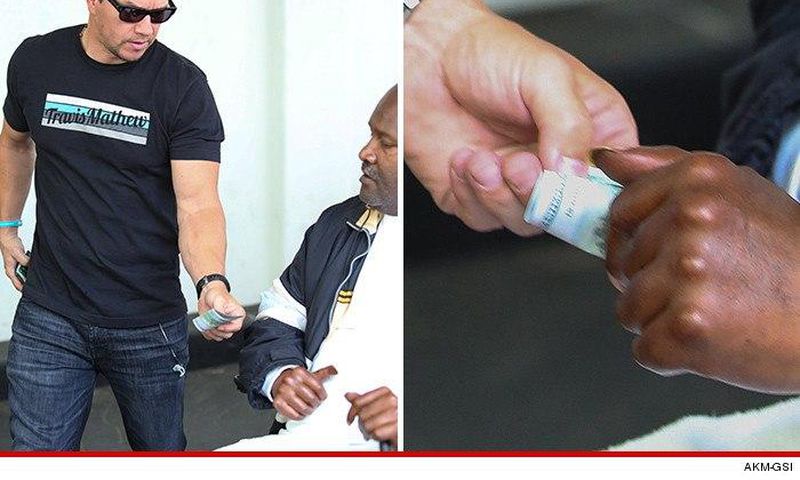Mark Wahlberg gives homeless man $100 bill in Beverly Hills