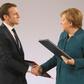 European news media associations wrote to French President Emmanuel Macron (L, pictured January 22, 2019) and German Chancellor Angela Merkel, saying a failure to reach an agreement would "jeopardise the whole EU copyright reform"