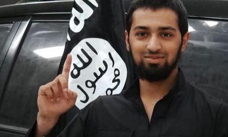 ISIS media posted images of a boy the group called Abu Yousef al Britani, in one picture, the teen known as Talha Asmal back in England raises his index finger
