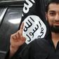 ISIS media posted images of a boy the group called Abu Yousef al Britani, in one picture, the teen known as Talha Asmal back in England raises his index finger